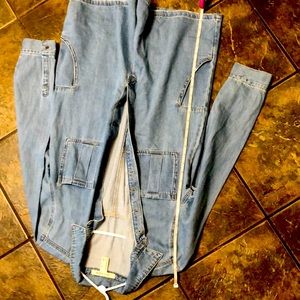 NWT Long Sleeve Denim Shortall Romper w/pockets. Button up closure.